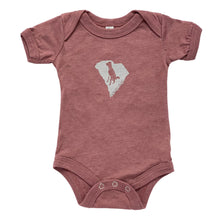 Load image into Gallery viewer, Pink Baby Onesie with a silhouette of a dog South Carolina
